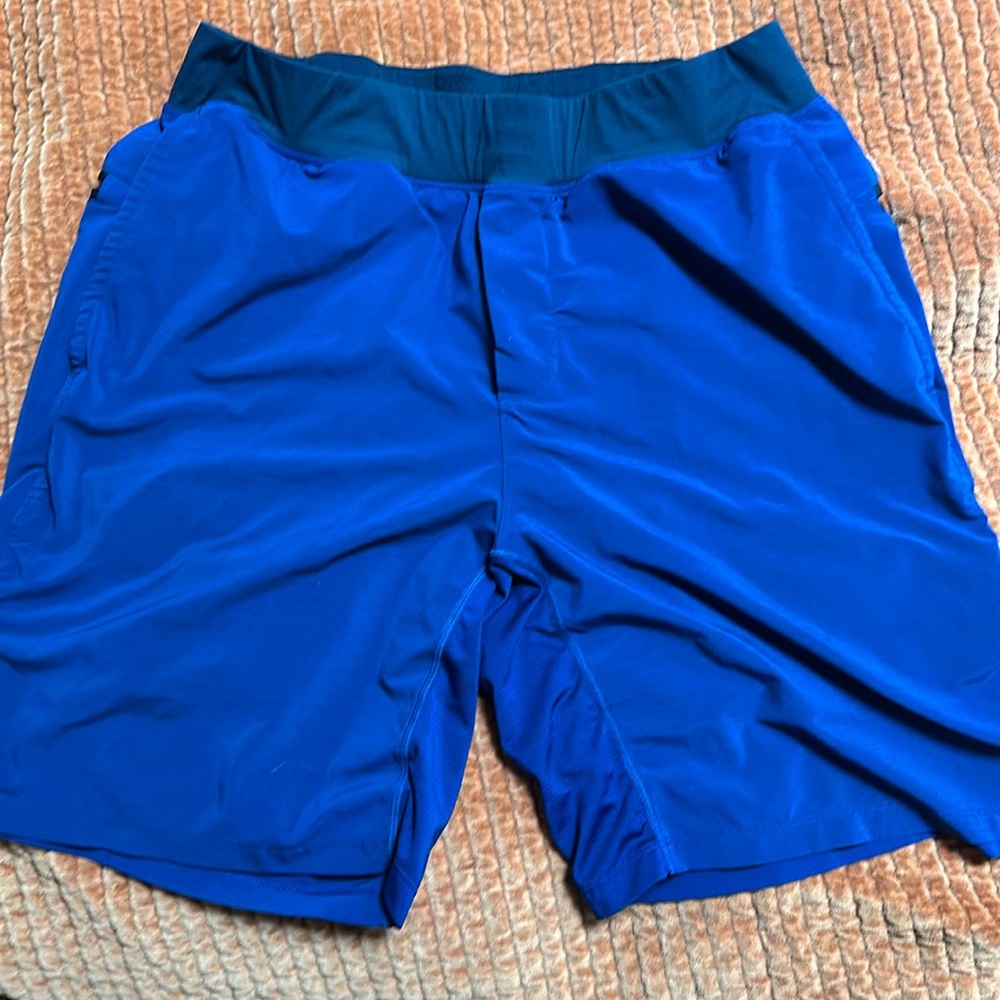 Men’s Fabletics Medium Fundamental Short with Liner. Length: 7 inches.